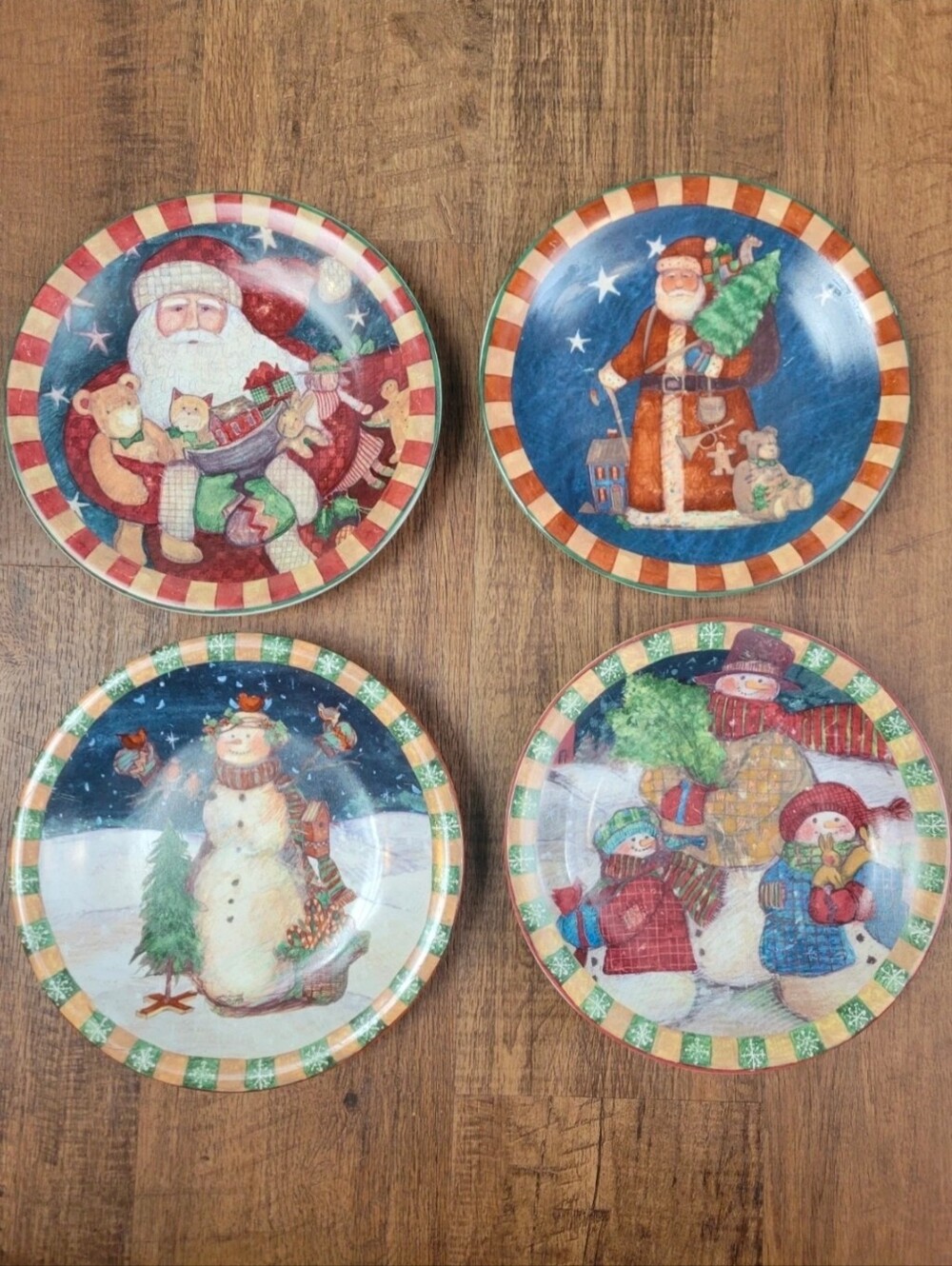 Susan Winget Certified International set of 4 Christmas plates